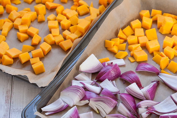 Butternut squash and red onion ready to be roasted.