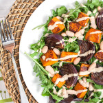 Roasted butternut squash salad with oil-free cashew dressing.