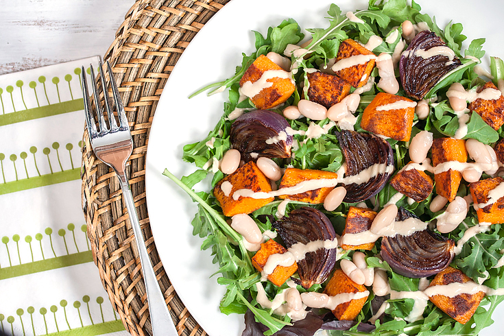 Roasted butternut squash salad with oil-free cashew dressing.
